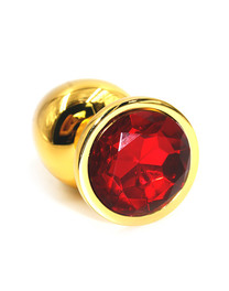 Пробка анальная металлическая золотистая с красным кристаллом (длина — 7,0 см, диаметр — 2,6 см)